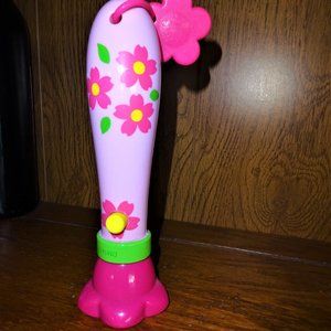 Flower power child flashlight toy